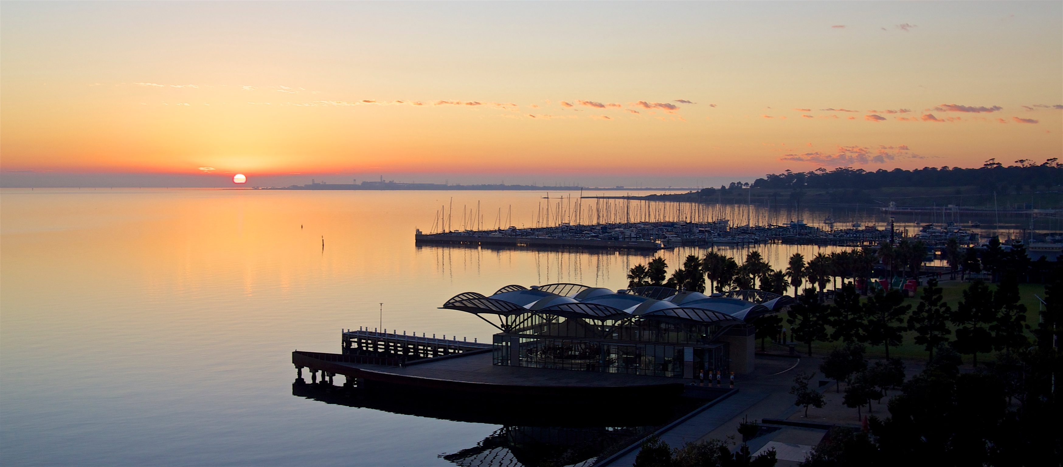 Sunrise over the Geelong Carousel and waterfront